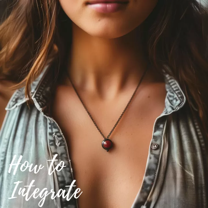 Person wearing a bloodstone necklace